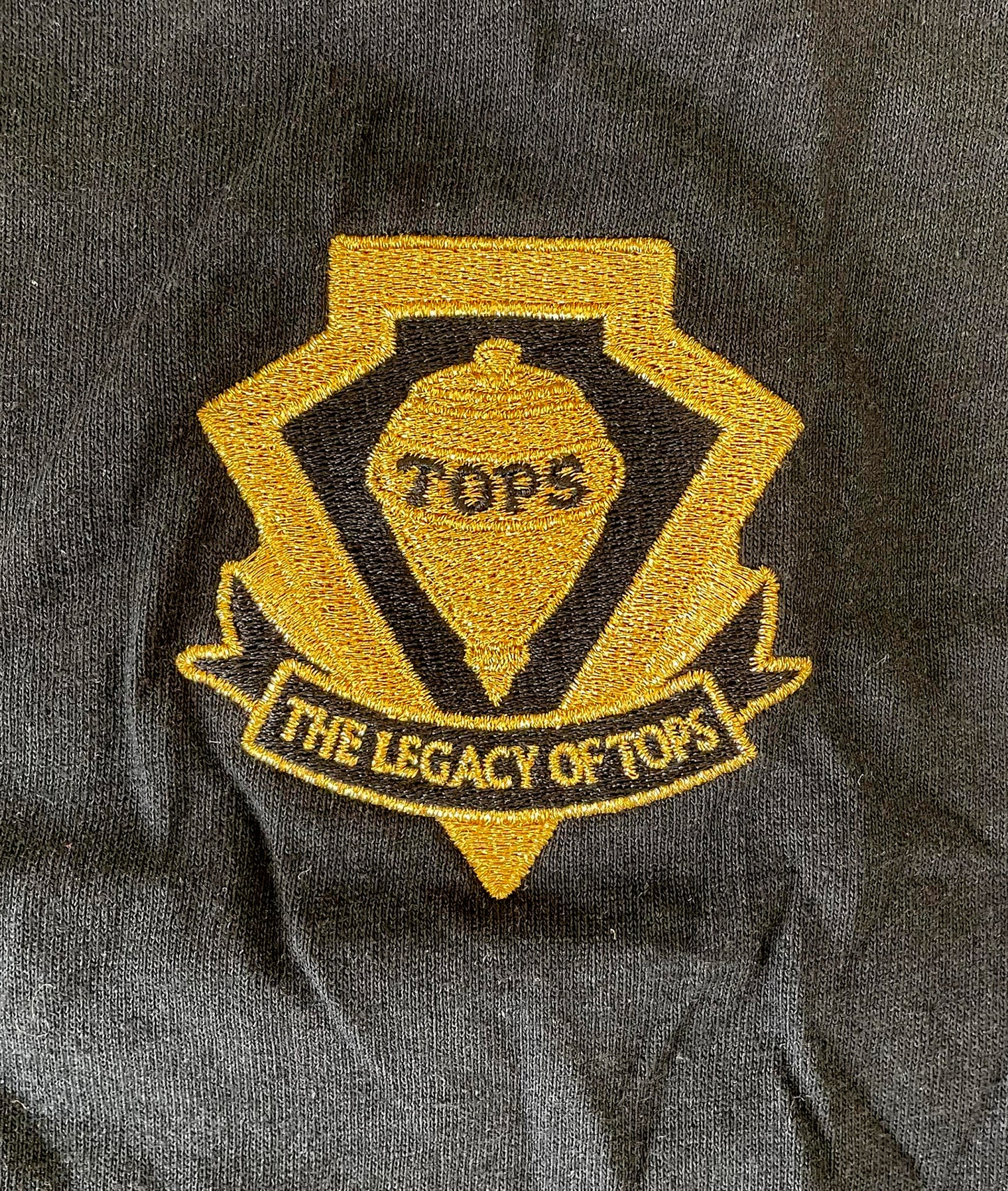 The Legacy of TOPS Embroidered T-Shirt